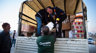 Concern staff unloading truck of supplies in Turkiye