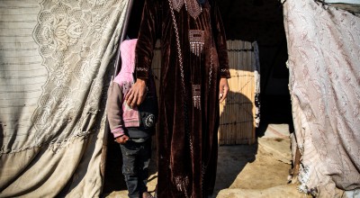 Amira* with her daughter outside of the tent where they live in Syria Photo: Gavin Douglas/Concern Worldwide *Name has been changed