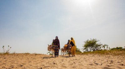 Harta* (60), Hamila* (8), Hdidja* (30) and Fadoul* (7) travel to far distances to find water in Chad. (Photo: Gavin Douglas/Concern Worldwide, names changed for security)