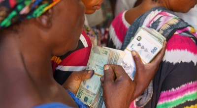 Women after receiving cash at Concern distribution site, Fizi territory, South Kivu province, eastern DRC. Photo: Rudy Kimvuidi/Mercy Corps