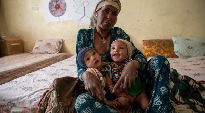 Azalu Tamu is a 38-year-old mother and a housewife from Ertnago Silase village in Guayent Kabele, Beyeda Woreda, North Gondar Zone, Amhara. She is married to a farmer and has seven children, including 9-month-old twin girls named Tenay Mihret and Asmra Mihret. Photo: Eugene Ikua/Concern Worldwide