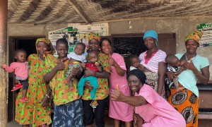 Mothers and nurses at a Peripheral Health Clinic in Magabana Community, Sierra Leone