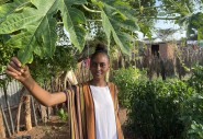 Young woman in a kitchen garden in Kenya