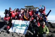 Team Concern celebrates after reaching peak of Kilimanjaro