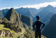Woman surveying mountains